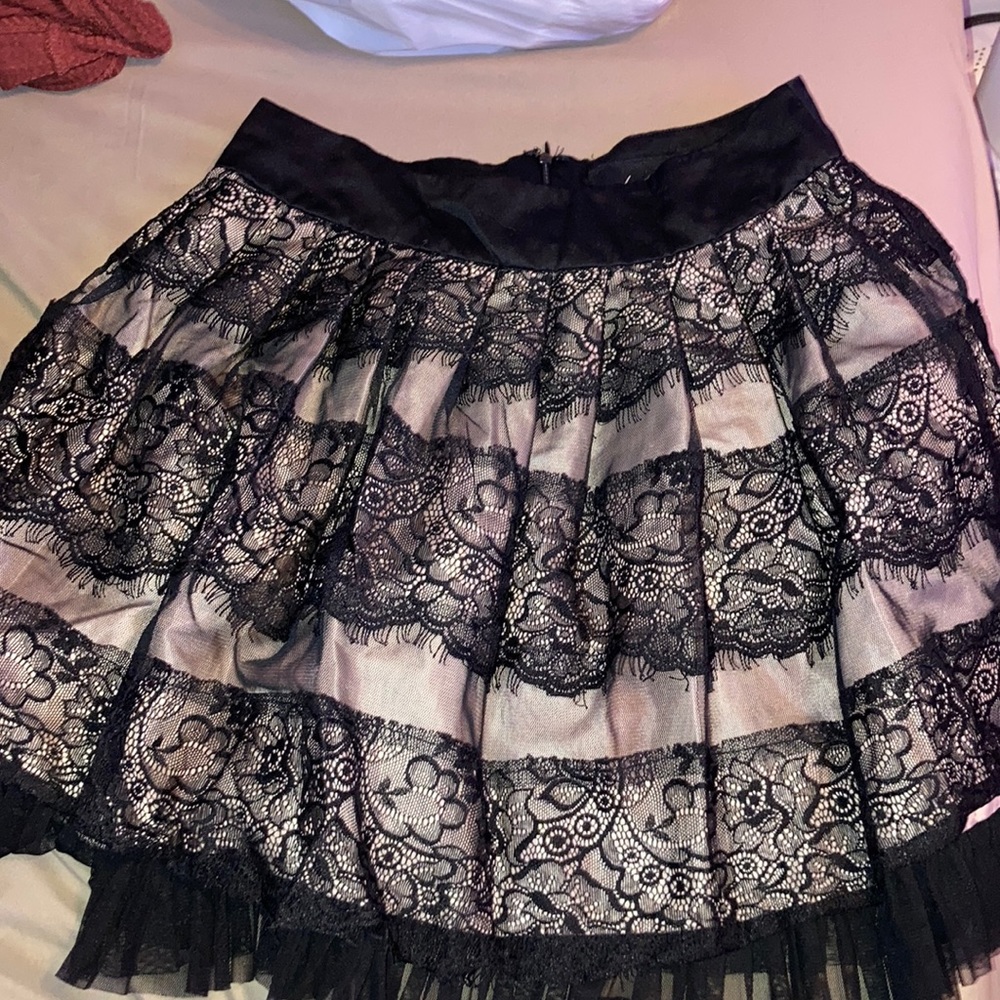 Black and Tan skirt. Brand is Twenty One. Size XS